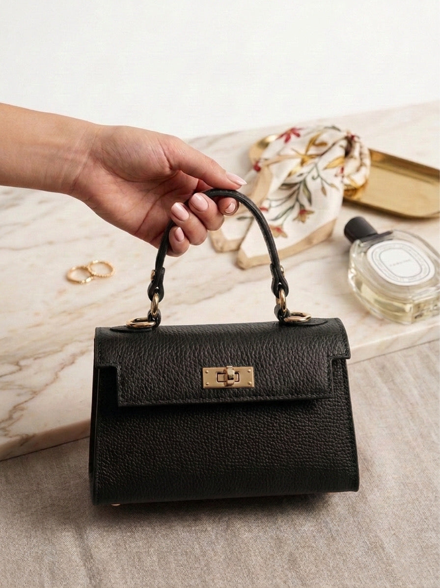 Bolso de mano estructurado - diseño clasico con herrajes dorados