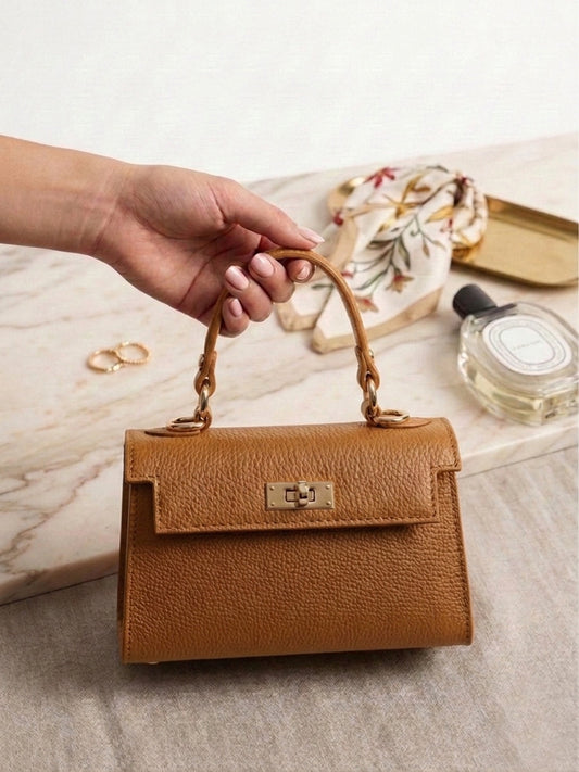 Bolso de mano estructurado - diseño clasico con herrajes dorados