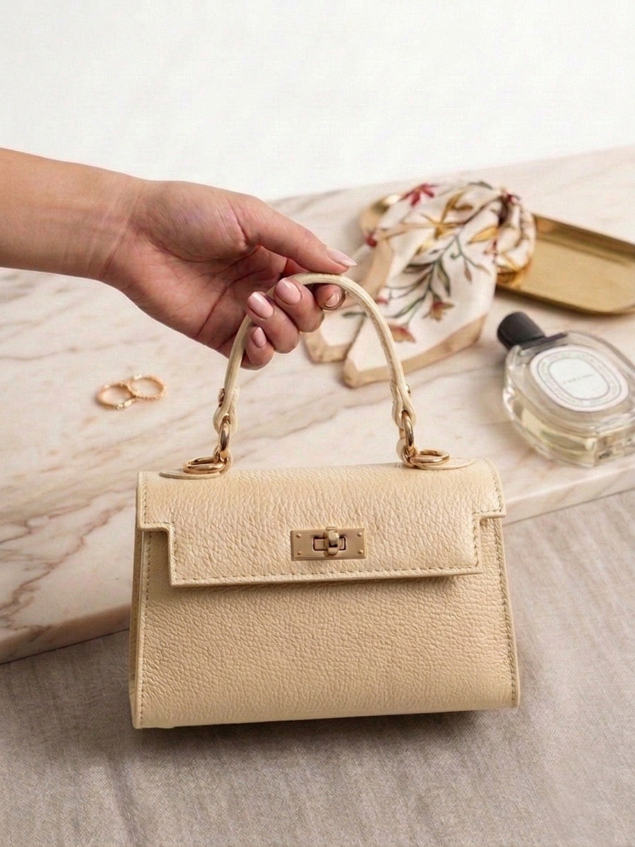 Bolso de mano estructurado - diseño clasico con herrajes dorados