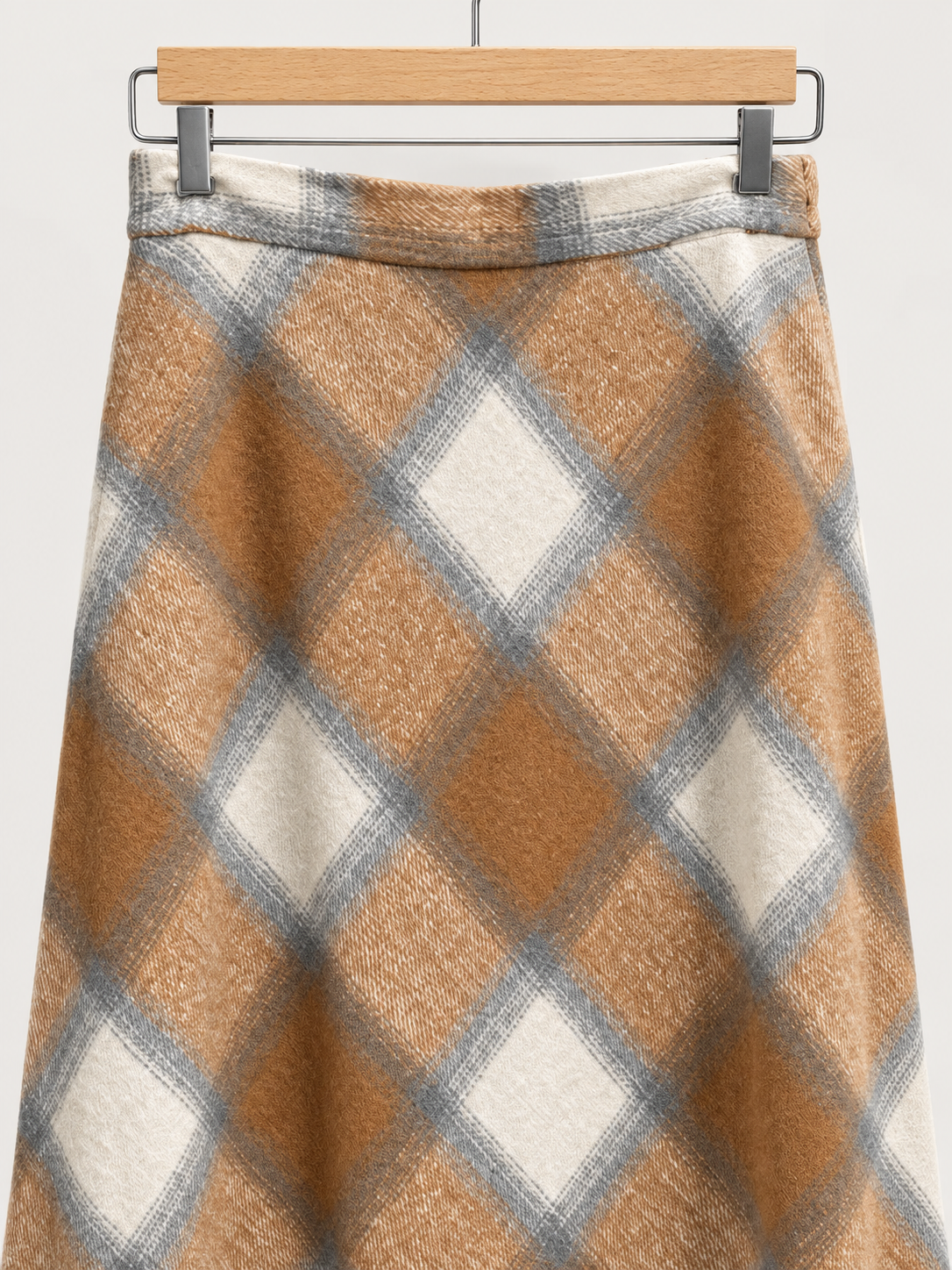Cintura y estampado de la falda de cuadros camel